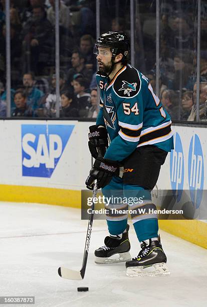 Nick Petrecki of the San Jose Sharks controls the puck behind his goal against the Anaheim Ducks at HP Pavilion on January 29, 2013 in San Jose,...