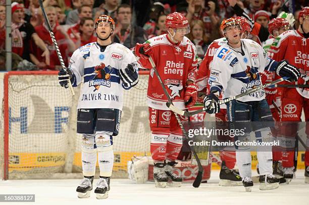 Jeffrey Giuliano of Iserlohn reacts during the DEL match between Koelner Haie and Iserlohn Roosters at Lanxess Arena on January 30, 2013 in Cologne,...