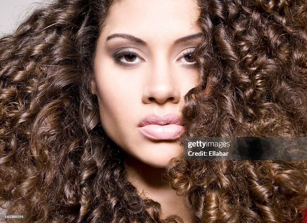 Curly Model Beautiful Model With Curly Hair High-Res Stock Photo - Getty Images