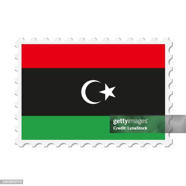 libya postage stamp. postcard vector illustration with libyan national flag isolated on white background. - libya flag stock illustrations