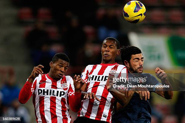 Georgino Wijnaldum and Marcelo Antonio Guedes Filho of PSV and Graziano Pelle of Feyenoord battle for the header during the KNVB Dutch Cup match...