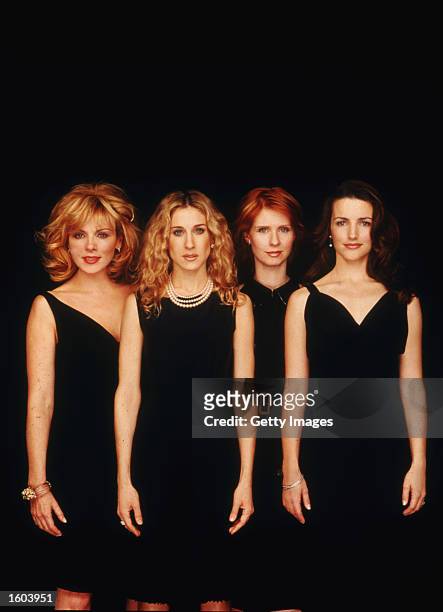 Left to right, actresses Kim Cattrall, Sarah Jessica Parker, Cynthia Nixon, and Kristin Davis pose for a portrait in an undated photo on the set of...
