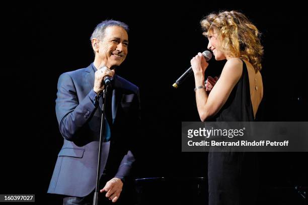 Alain Chamfort and Claire Keim perform at Le Grand Rex on January 30, 2013 in Paris, France.