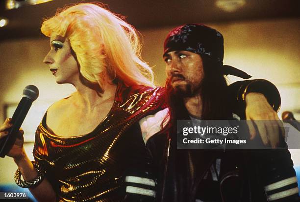Actors John Cameron Mitchell, left, and Michael Pitt perform in a scene from the film "Hedwig and the Angry Inch."