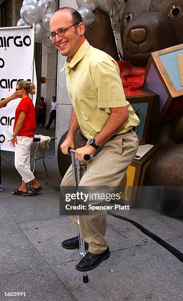 President of Razor USA LLC Carlton Calvin demonstrates how to ride on the Razor USA''s new product, the Airgo, July 24, 2001 in New York City. The...