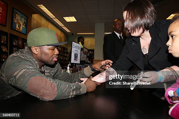 Cent promotes the new book "Formula 50: A 6-Week Workout and Nutrition Plan That Will Transform Your Life" at Barnes & Noble, Fresh Meadows on...