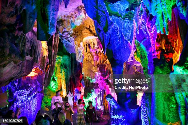 Tourists visit the Jinshui Rock Cave in Guilin, Guangxi Zhuang Autonomous region, China, Aug. 7, 2023. Jinshui Rock Cave is the world famous...