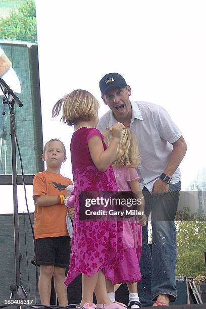 Lance Armstrong introduces his children, Luke Armstrong and twins, Isabelle Armstrong and Grace Armstrong at the "Thank You Austin" event after his...