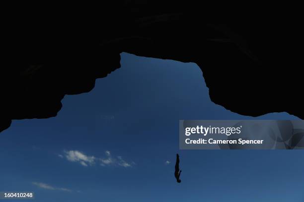 Andy Jones of the United States competes during the Red Bull Cliff Diving qualifying round in the Hawkesbury River on January 31, 2013 in Sydney,...