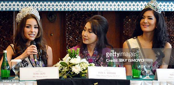 Newly-crowned Miss Universe 2012 Olivia Culpo of the US answers questions during a press conference in Jakarta on January 31, 2013 as the chairman of...
