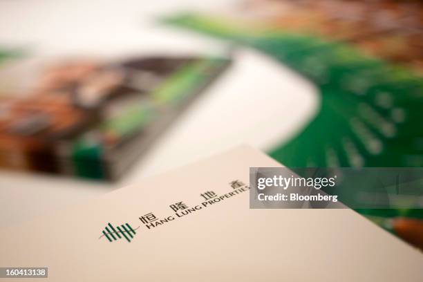 Hang Lung Properties Ltd. Brochures are displayed on a table during a news conference in Hong Kong, China, on Thursday, Jan. 31, 2013. Hang Lung, the...