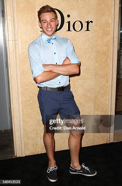 Matthew Mitcham poses at the opening of the Christan Dior Sydney store on January 31, 2013 in Sydney, Australia.