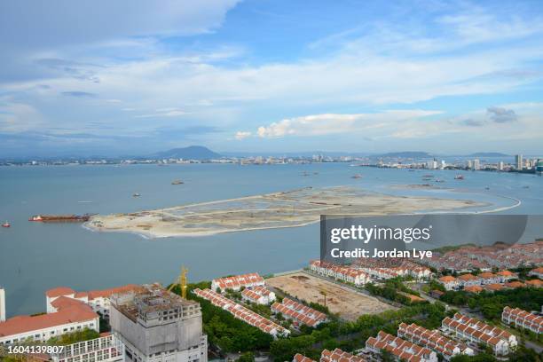 reclaimed island and sea view of penang island malaysia - reclaimed stock pictures, royalty-free photos & images