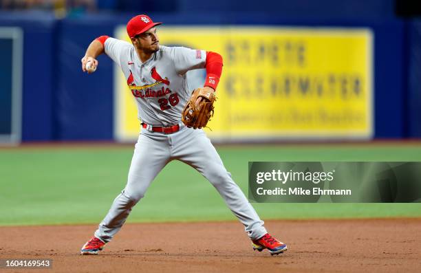 Nolan Arenado of the St. Louis Cardinals makes a throw to first in the first inning during a game against the Tampa Bay Rays at Tropicana Field on...