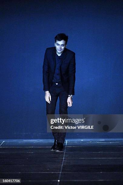 Fashion designer Hedi Slimane walks the runway at the Saint Laurent Spring Summer 2013 fashion show during Paris Fashion Week on October 1, 2012 in...