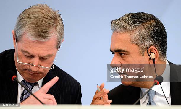 Juergen Fitschen and Anshu Jain, Co-CEOs of Deutsche Bank, speak during the company's annual press conference to announce its financial results for...