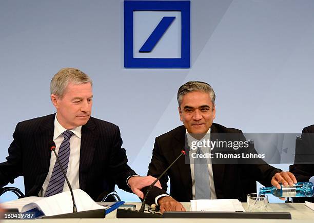 Juergen Fitschen and Anshu Jain, Co-CEOs of Deutsche Bank, attend the company's annual press conference to announce its financial results for 2012 on...