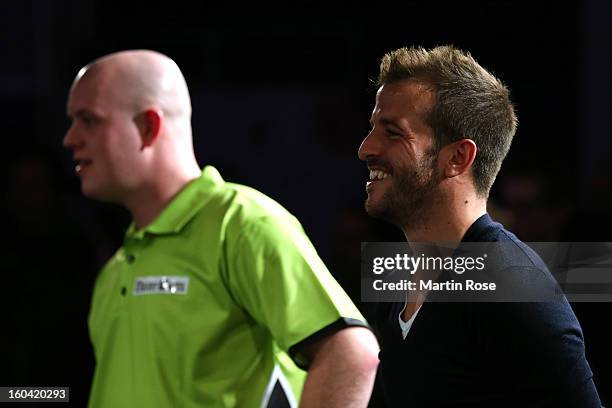 Rafael van der vaart of Hamburg looks on during a dart show tournament at between team Netherlands and Hamburger SV at Imtech Arena on January 31,...