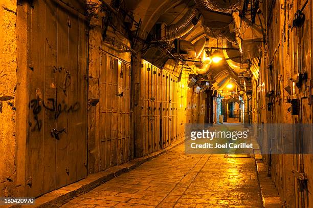 jerusalem old city alley at night - jerusalem market stock pictures, royalty-free photos & images