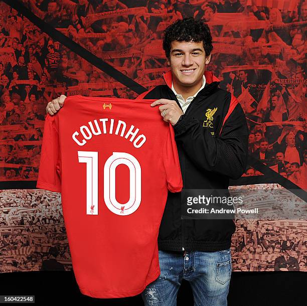 Philippe Coutinho poses with the club shirt after signing for Liverpool FC on January 30, 2013 in Liverpool, England.