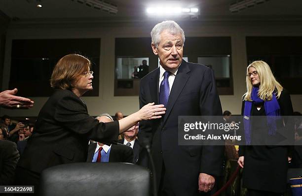 Former U.S. Senator Chuck Hagel arrives at his confirmation hearing to become the next secretary of defense before the Senate Armed Services...