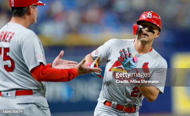 Lars Nootbaar of the St. Louis Cardinals is congratulated after hitting a home run in the seventh inning during a game against the Tampa Bay Rays at...