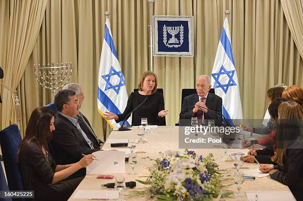 Israeli President Shimon Peres meets with representatives of Hatenua chaired by Tzipi Livni to discuss forming a new Israeli government on January...