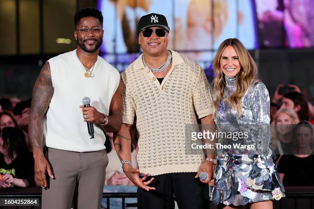 Nate Burleson, LL Cool J, and Keltie Knight attend the "Superfan" Series Premiere Watch Party in Times Square on August 09, 2023 in New York City.