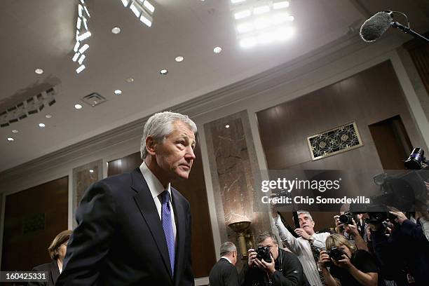 Former U.S. Sen. Chuck Hagel arrives for his confirmation hearing to become the next secretary of defense before the Senate Armed Services Committee...