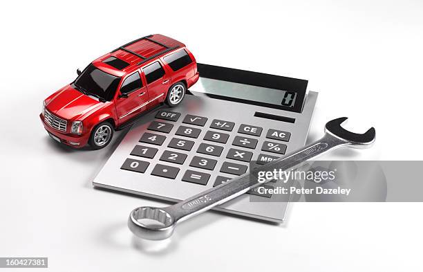 the cost of motoring/driving - toy car white background stock pictures, royalty-free photos & images