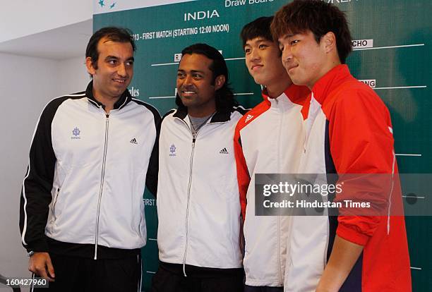 Indian and Korean doubles pairs after the draw for Davis Cup Asia/Oceania Group I at Delhi Lawn Tennis Association tennis court on January 31, 2013...