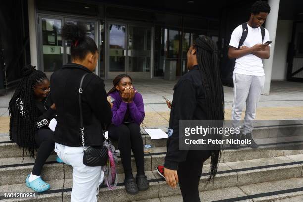 Students react after receiving their A-Level results at City of London Academy on August 17, 2023 in London, England. Due to a change in the way the...