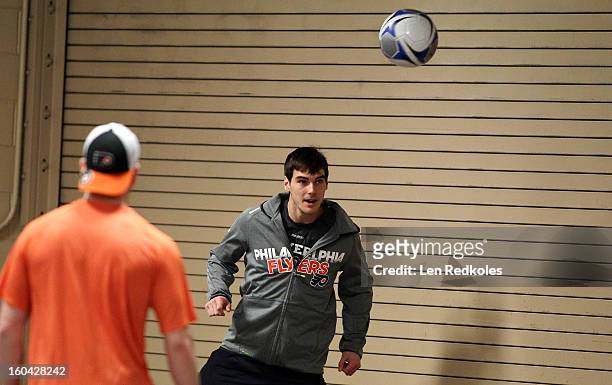 Eric Wellwood of the Philadelphia Flyers plays soccer prior to his game against the New York Rangers on January 24, 2013 at the Wells Fargo Center in...