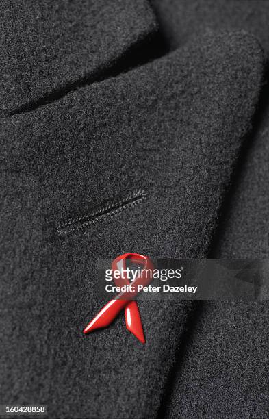 hiv awareness badge - world aids day stock pictures, royalty-free photos & images