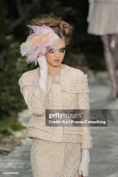 Model walks the runway at the Chanel Spring Summer 2013 fashion show during Paris Haute Couture Fashion Week on January 22, 2013 in Paris, France.