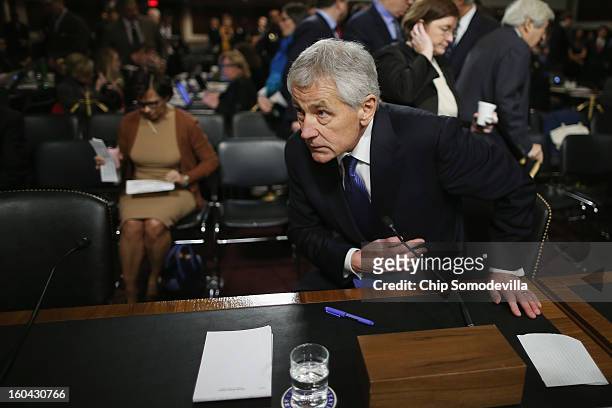 Former U.S. Senator Chuck Hagel returns to his confirmation hearing to become the next secretary of defense before the Senate Armed Services...