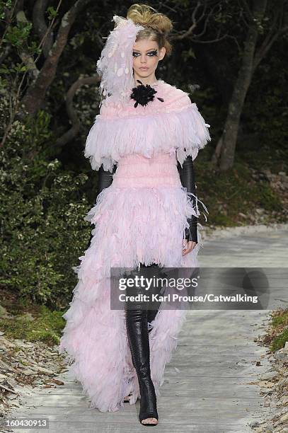 Model walks the runway at the Chanel Spring Summer 2013 fashion show during Paris Haute Couture Fashion Week on January 22, 2013 in Paris, France.