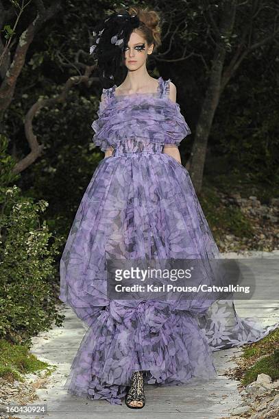 Model walks the runway at the Chanel Spring Summer 2013 fashion show during Paris Haute Couture Fashion Week on January 22, 2013 in Paris, France.