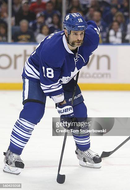 Mike Brown of the Toronto Maple Leafs lines up during a face-off during their NHL game against the Buffalo Sabres at First Niagara Center on January...