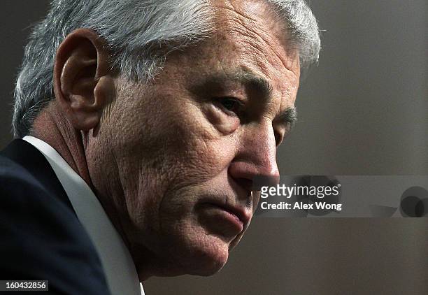 Former U.S. Sen. Chuck Hagel pauses as he testifies before the Senate Armed Services Committee during his confirmation hearing to become the next...