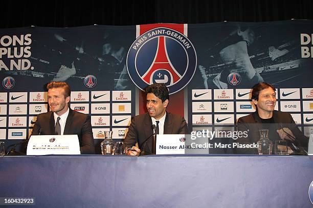 International soccer player David Beckham, Nasser Al-Khelaifi and Leonardo attend the press conference for his PSG signing at Parc des Princes on...