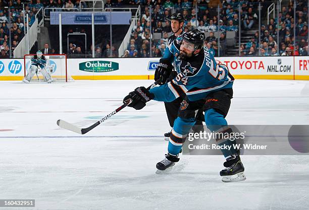 Nick Petrecki of the San Jose Sharks takes a shot against the Anaheim Ducks at the HP Pavilion on January 29, 2013 in San Jose, California. The...