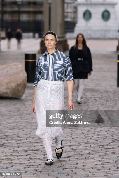 Model walks the runway at the Baum und Pferdgarten show during the Copenhagen Fashion Week Spring/Summer 2024 on August 09, 2023 in Copenhagen,...