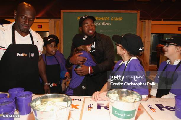 FedEx enlisted Green Bay Packers wide receiver Donald Driver and Washington Redskins running back Alfred Morris to run a lemonade stand with Junior...