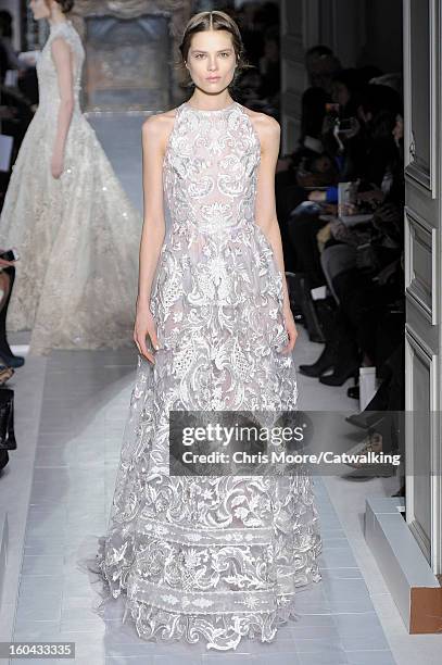 Model walks the runway at the Valentino Spring Summer 2013 fashion show during Paris Haute Couture Fashion Week on January 23, 2013 in Paris, France.