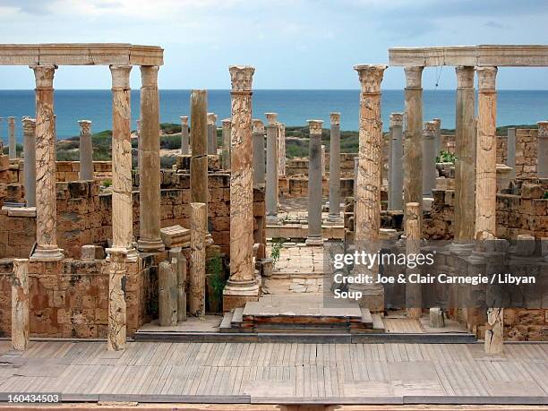 roman theatre, leptis magna, libya. - ruins of leptis magna stock pictures, royalty-free photos & images
