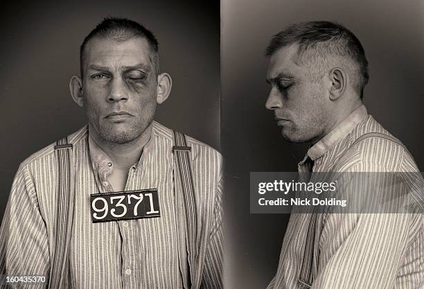 crazy jake wanted mugshot - black eye stockfoto's en -beelden