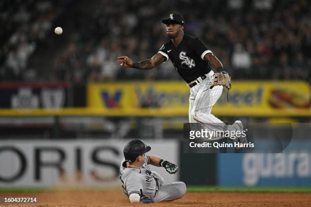 Tim Anderson of the Chicago White Sox turns a double play in the seventh inning against Kyle Higashioka of the New York Yankees at Guaranteed Rate...