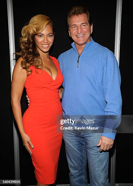 Beyonce and former NFL player Joe Theismann pose backstage at the Pepsi Super Bowl XLVII Halftime Show Press Conference at the Ernest N. Morial...