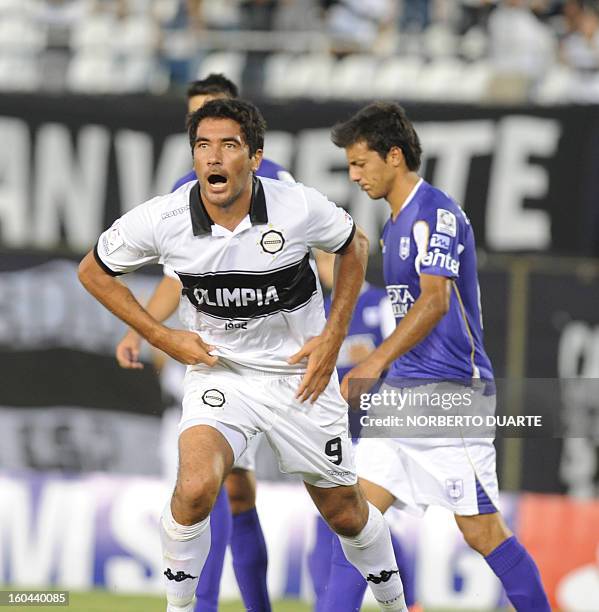 Paraguay´s Olimpia player Juan Carlos Ferreyra celebrates after scoring against Uruguay´s Defensor during their 2013 Copa Libertadores football match...